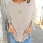 Vrouwenblouse in relaxed model met opgestroopte mouwen
