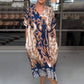 Comfortabele jurk met korte mouwen en V-hals print