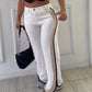 Damesbroek met hoge taille en contrasterende zijstreep