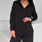 Elegante vrouwelijke set bestaande uit shirt en broek