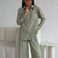 Elegante vrouwelijke set bestaande uit shirt en broek