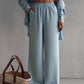 Elegante vrouwelijke set bestaande uit shirt en broek