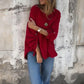 Vrouwenblouse in relaxed model met opgestroopte mouwen