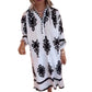 Verfijnde oversized shirtjurk met decolleté