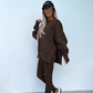 Een tweedelig set voor dames: effen sweatshirt met lange mouwen en een legging