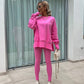 Een tweedelig set voor dames: effen sweatshirt met lange mouwen en een legging