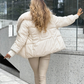 Elegante donsjas met een comfortabele, warme kraag
