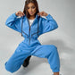 Comfortabele effen kleur dames jumpsuit met capuchon