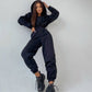 Comfortabele effen kleur dames jumpsuit met capuchon